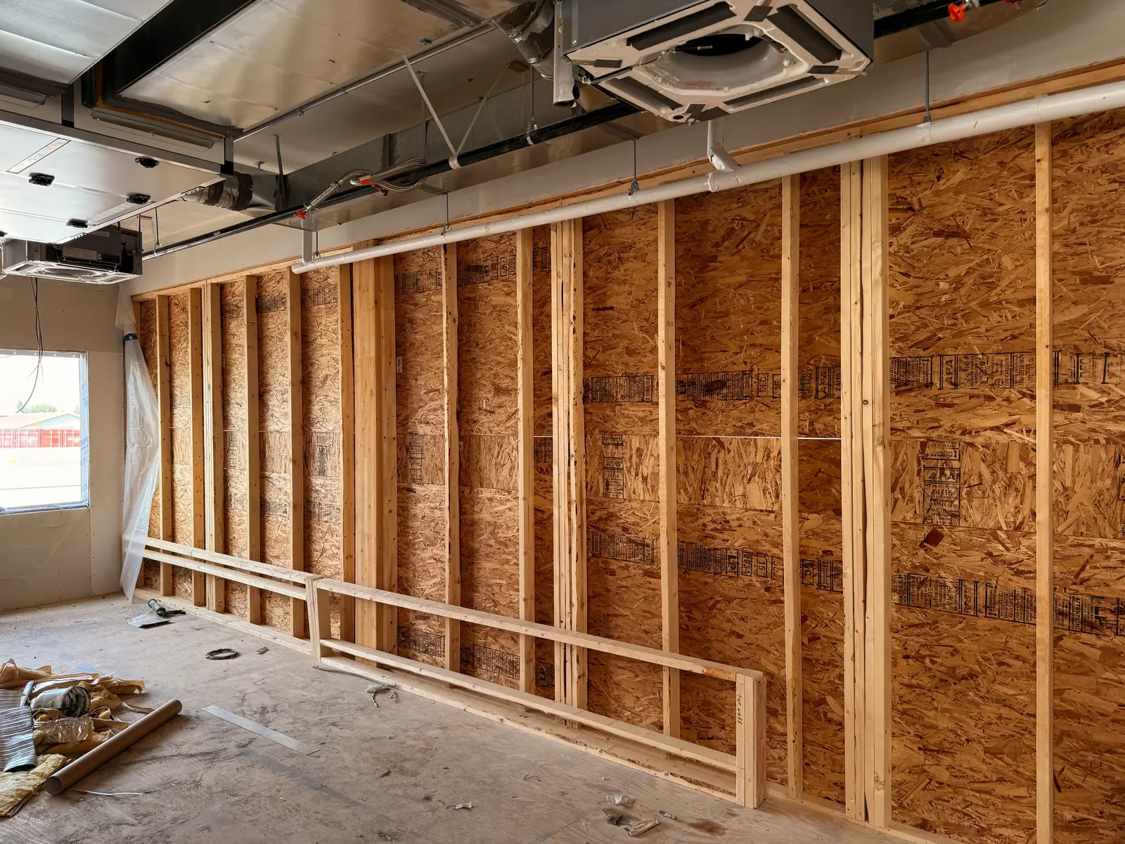Interior framing within a House of Hope module during factory assembly